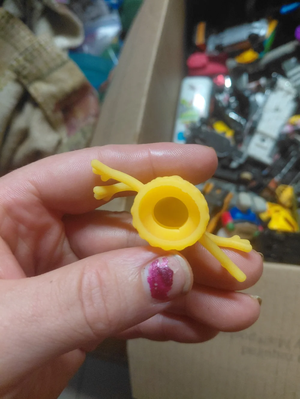 rubber alien monster finger puppet.